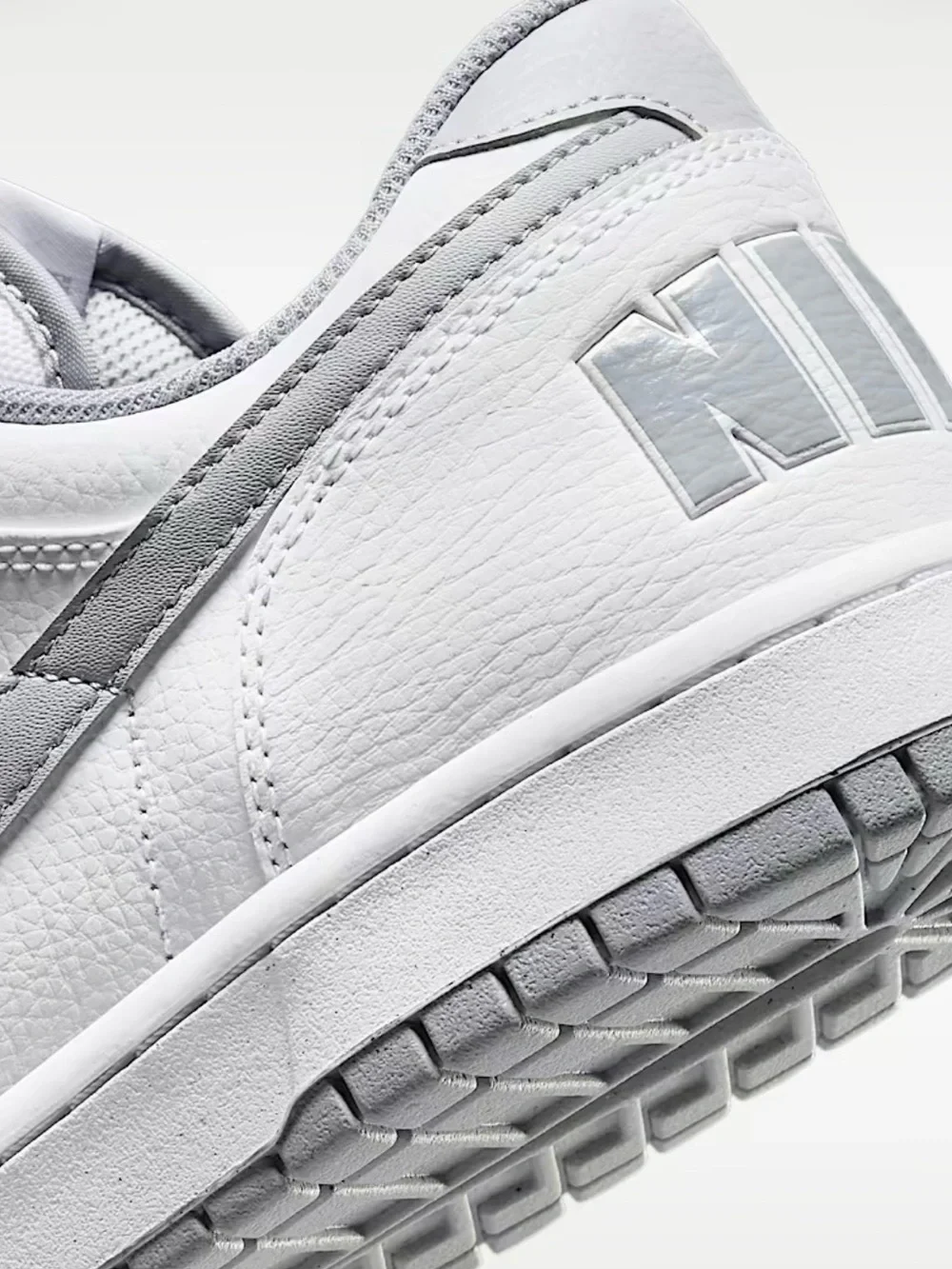 Nike Men’s White Sneakers with Gray Swoosh